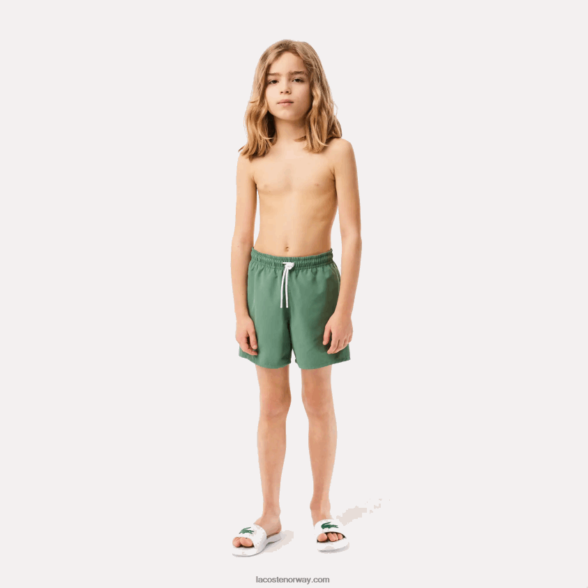 Lacoste hurtigtørkende solid badeshorts 4J4X0T3105 kakigrønn wij gutter