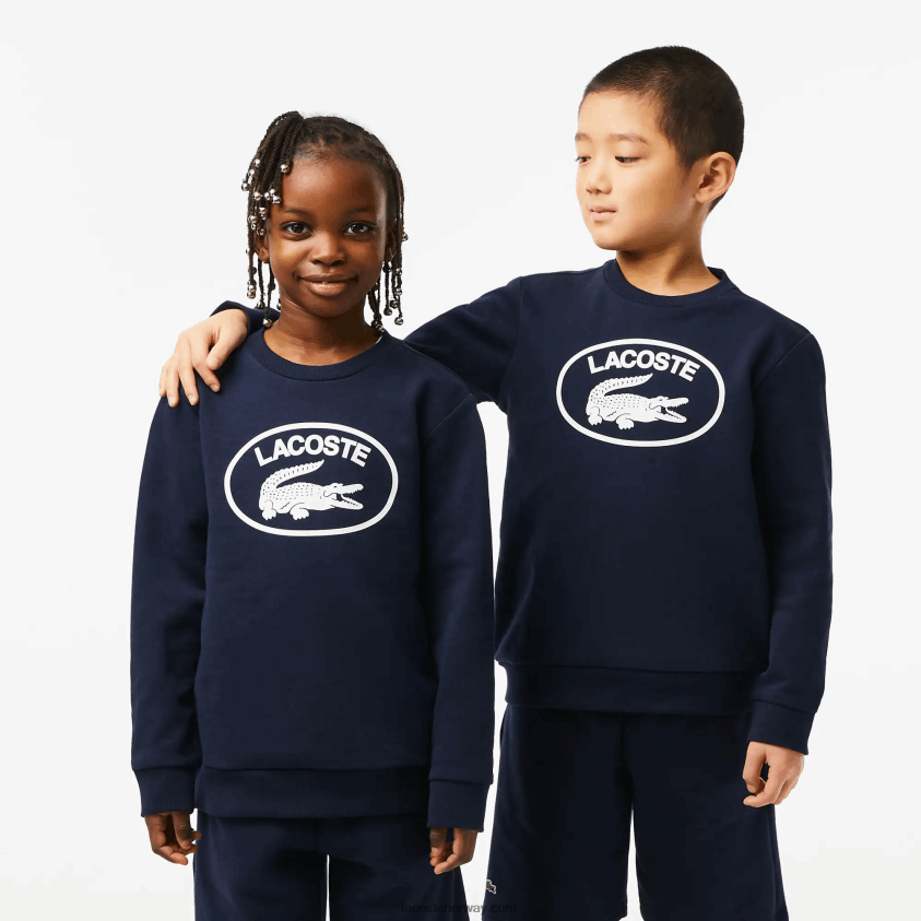 Lacoste kontrastmerket fargeblokkgenser 4J4X0T3055 marineblå hvit 525 barn