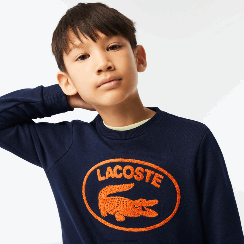 Lacoste kontrastmerket fargeblokkgenser 4J4X0T3056 marineblå 166 barn