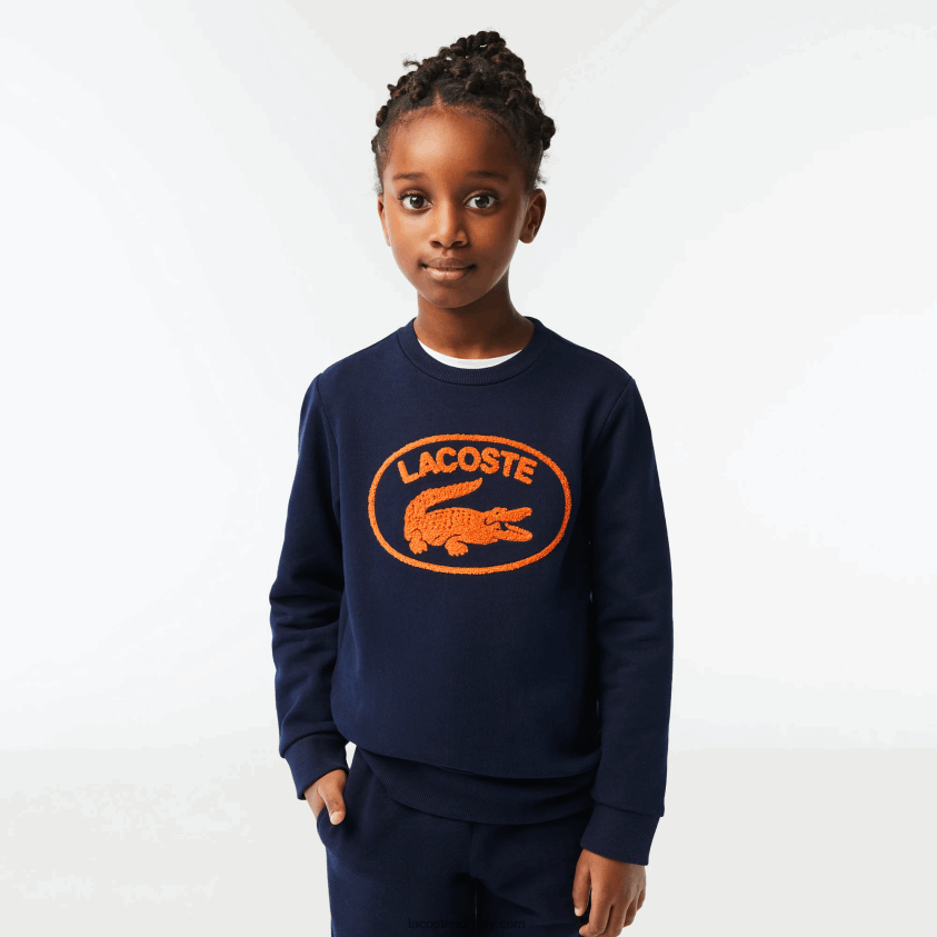 Lacoste kontrastmerket fargeblokkgenser 4J4X0T3056 marineblå 166 barn