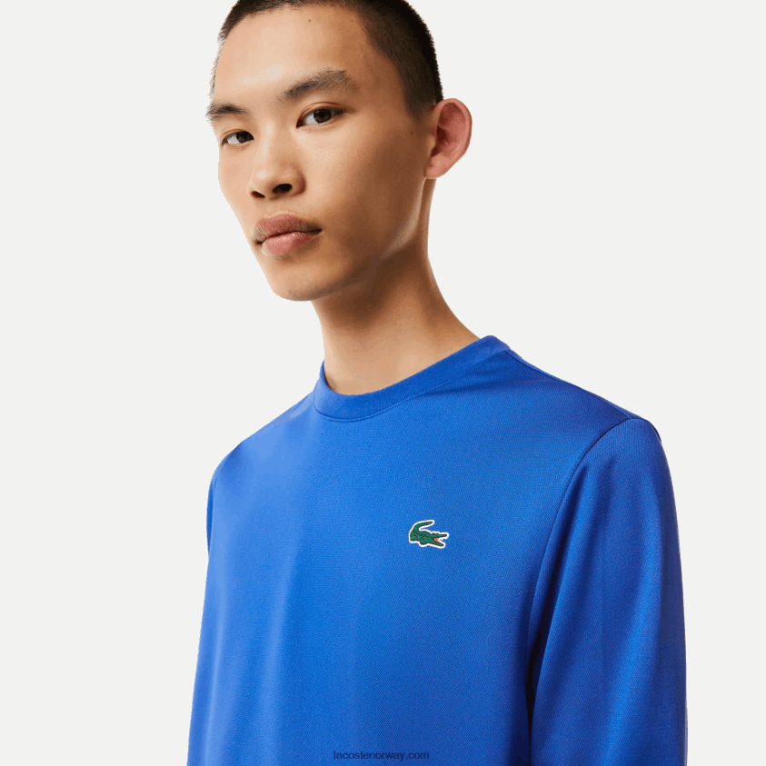 Lacoste tennisgenser med sportstrykk 4J4X0T1057 blå k1q menn