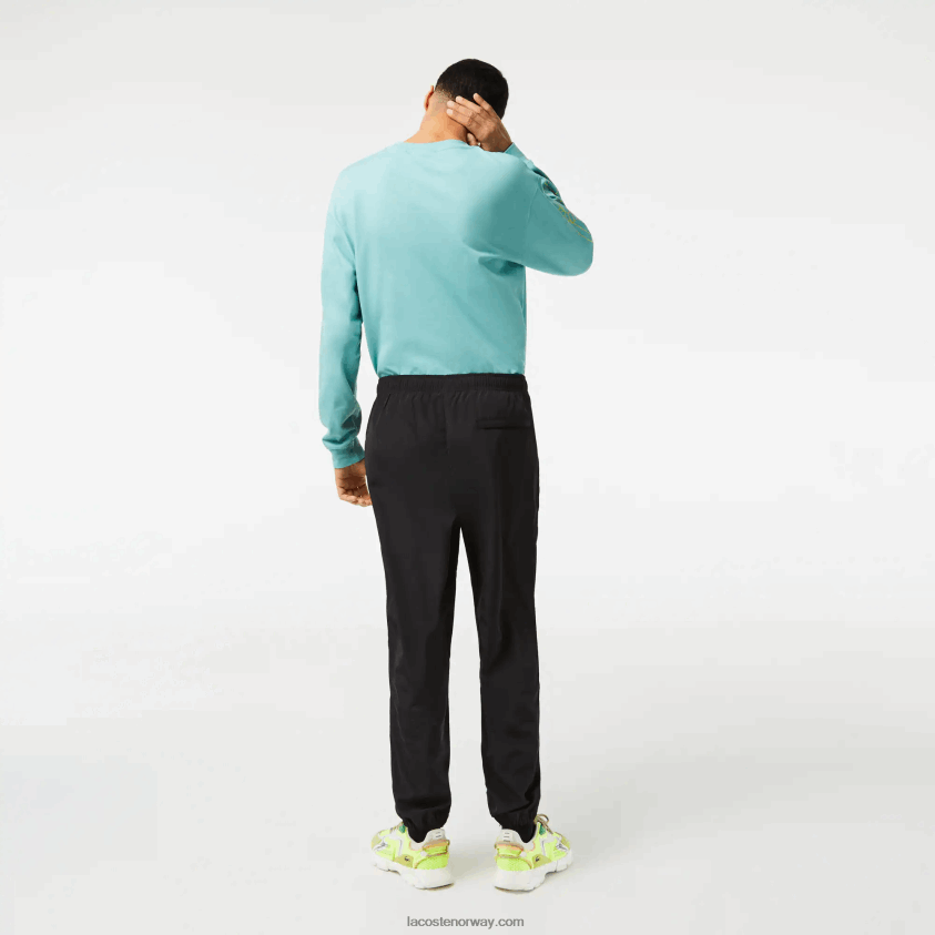 Lacoste joggebukser med gps-koordinater 4J4X0T304 svart 031 menn