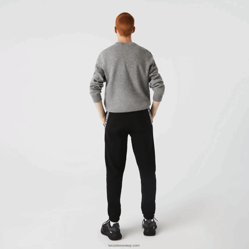 Lacoste joggebukser med trykte bånd 4J4X0T1459 svart 031 menn