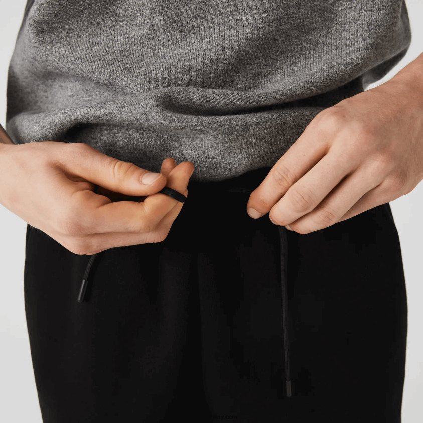 Lacoste joggebukser med trykte bånd 4J4X0T1459 svart 031 menn