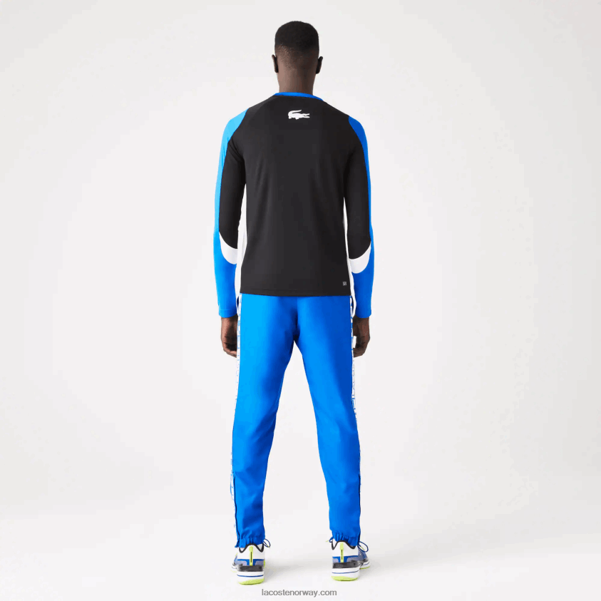 Lacoste tennis treningsbukser med trykk på siden 4J4X0T1087 blå k1q menn
