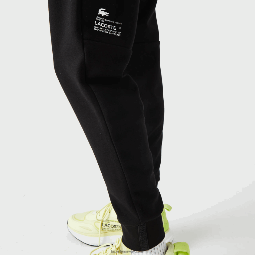 Lacoste treningsbukse med reflekterende trykk 4J4X0T1043 svart 031 menn