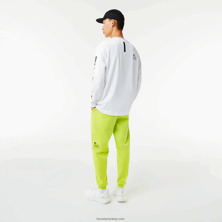 Lacoste treningsbukse med reflekterende trykk 4J4X0T1046 gul 90v menn