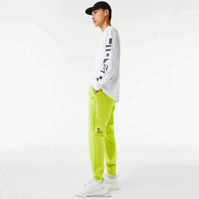 Lacoste treningsbukse med reflekterende trykk 4J4X0T1046 gul 90v menn
