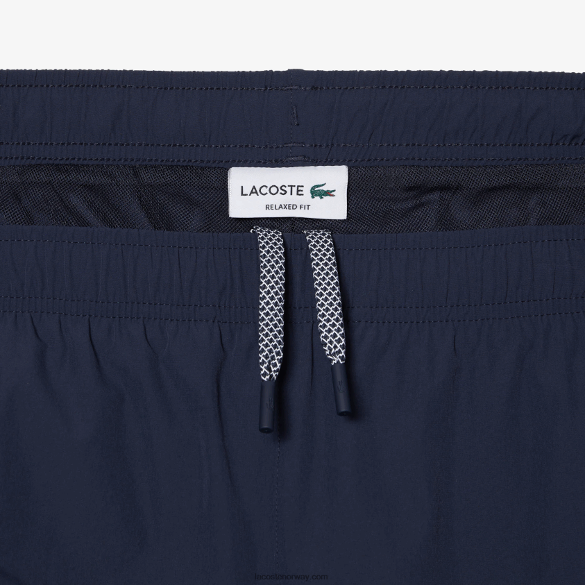 Lacoste vanntette treningsbukser med stretch 4J4X0T336 blå kxe menn