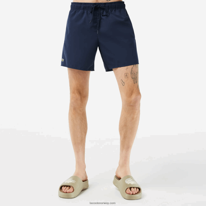 Lacoste lett hurtigtørkende badeshorts 4J4X0T536 marineblå grønn 802 menn