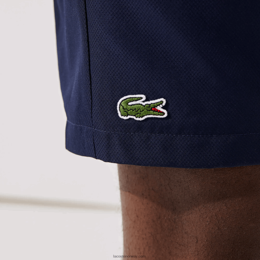 Lacoste sport tennis shorts med solid diamantvevdhet 4J4X0T1441 marineblå 166 menn