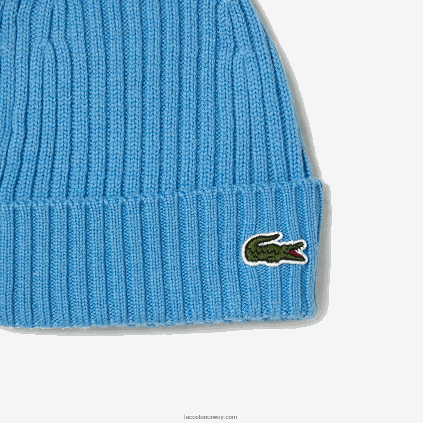 Lacoste ribbet lue i ull 4J4X0T2272 blå 4xa menn